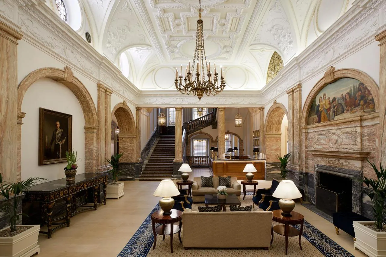 Grand lobby with chandelier and fireplace at The Landmark London